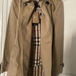 Brand new never worn Burberry trench coat